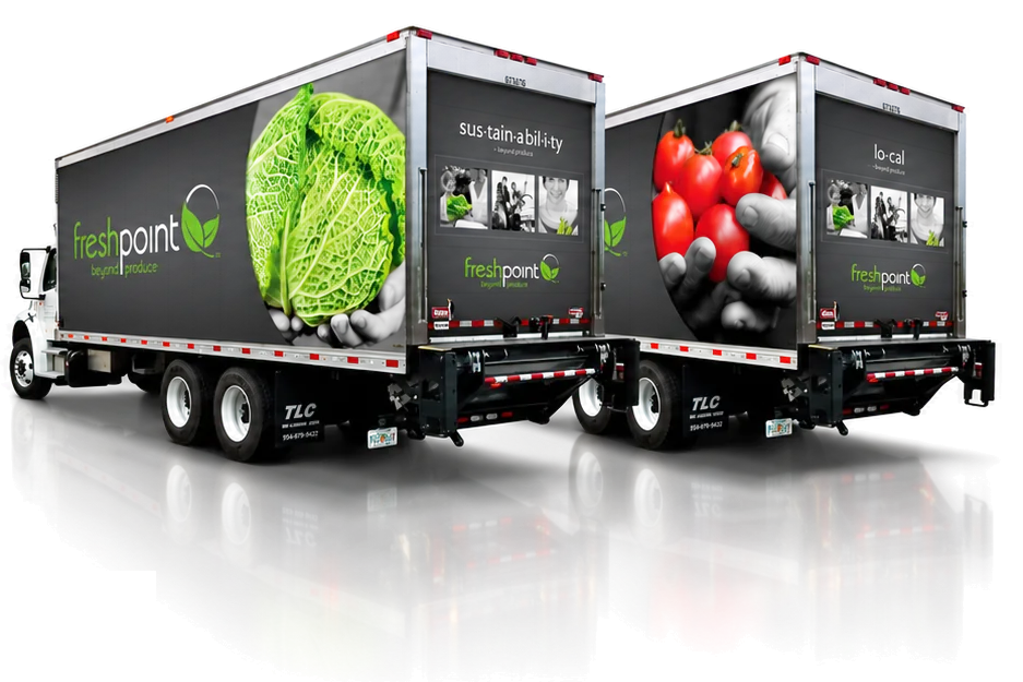 Two FreshPoint trucks wrapped with sustainability and local produce graphics